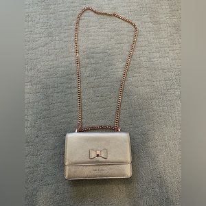 Ted Baker London rose gold crossbody bag.